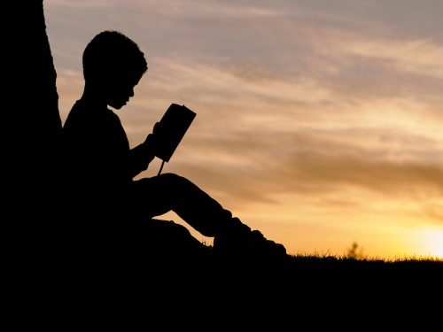 boy-reading-silhouette-aaron-burden-unsplash