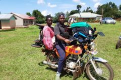 Loading up a family and a new wheelchair on a motorbike