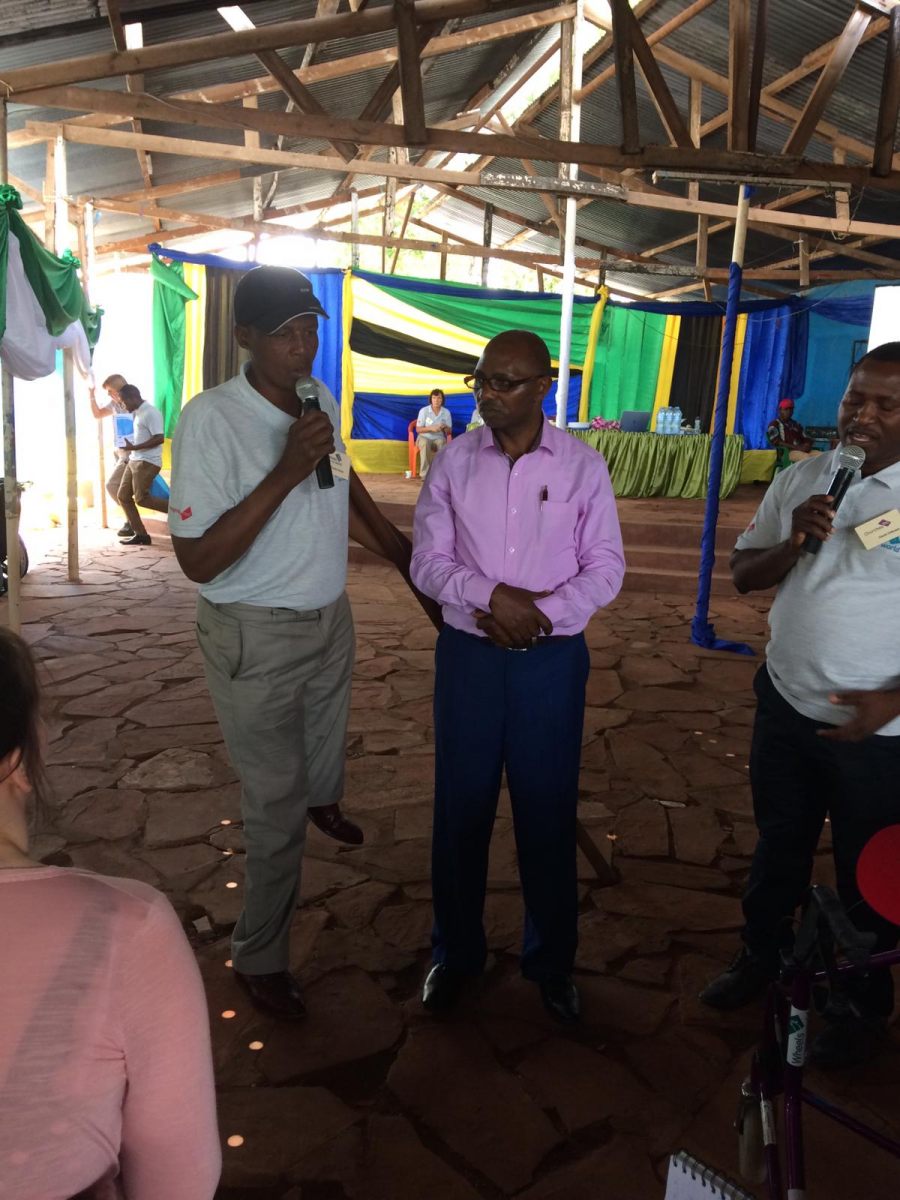 Charles and Pastor Davies speaking to a group at the training day
