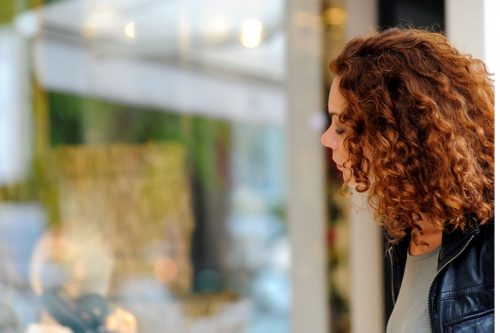 A lady looking into a shop window