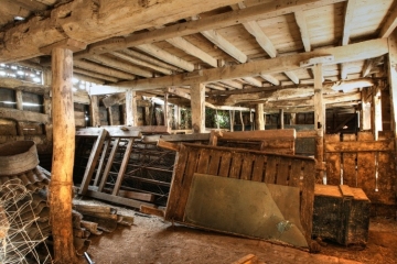 Traditional timber-framed cowshed.