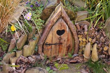 A minature hand-carved wooden door